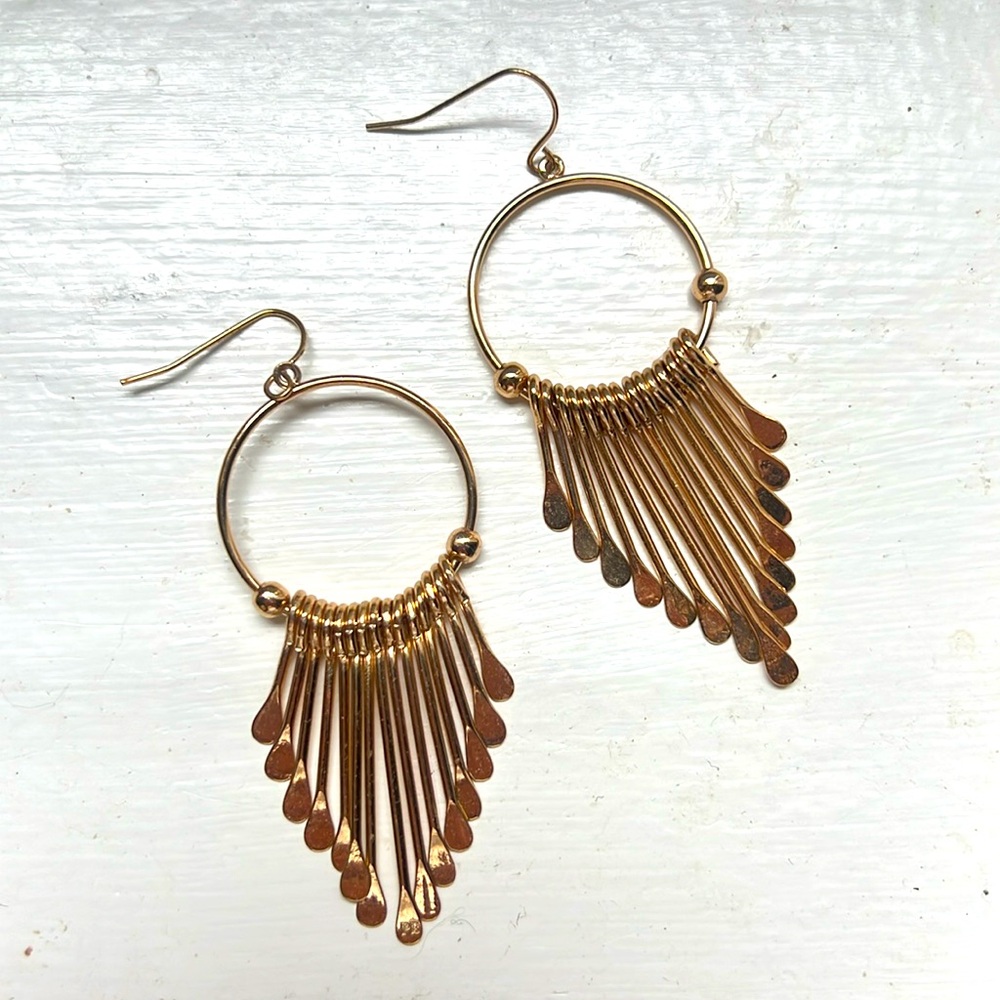 Gold toned dangle earrings